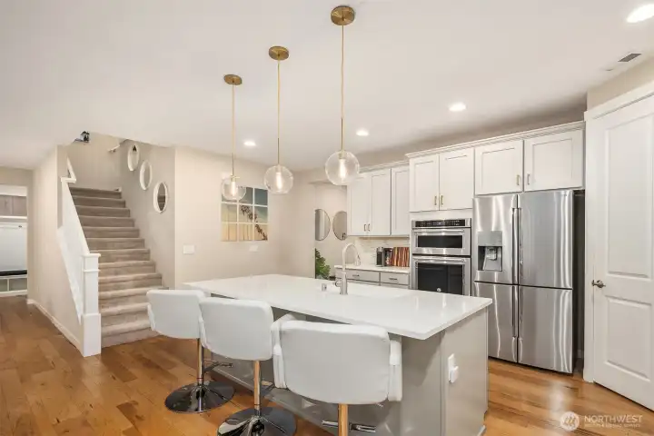 Updates/upgrades include wide-plank engineered flooring, updated lighting fixtures, A/C, tankless water heater, custom closets and more!