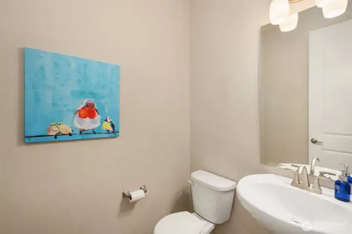 Just off the entrance foyer is a powder room for your guests, separate from the guest suite.