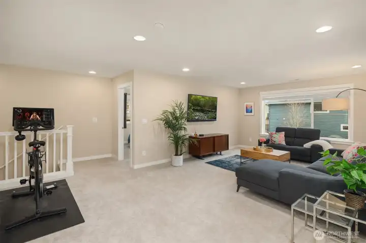 Stairs from lower level bring you up to the upstairs bonus/loft