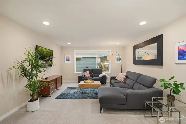 Upstairs find the bonus/loft space - perfect for movies, gaming and relaxing