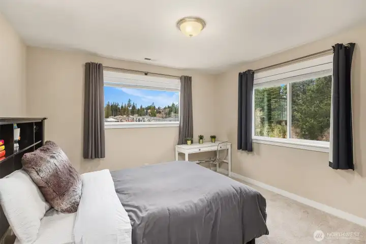 Another corner bedroom with dual windows