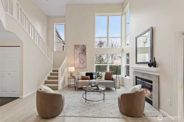Living Room-soaring ceilings and dramatic two-story windows!