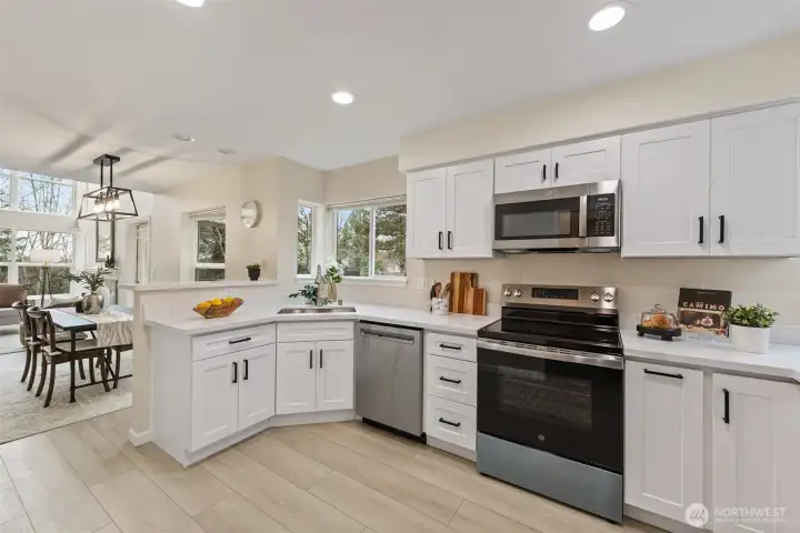 Fully renovated kitchen with new SS appliances.