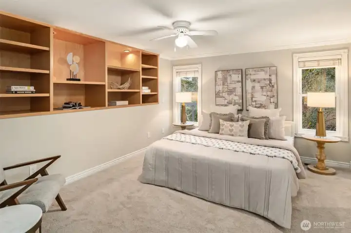 Stately primary suite with quality built-in and ensuite bathroom.