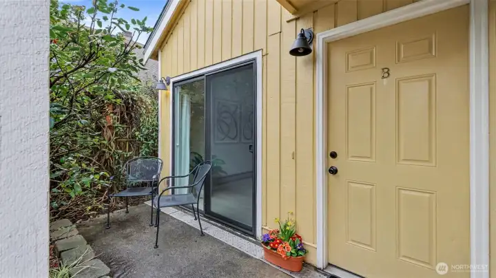 Both main floor units feature private front patios.