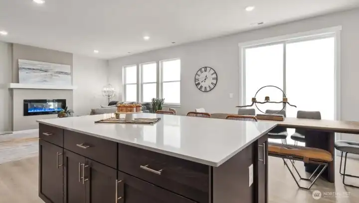 Kitchen open to dining area and great room making you always feel connected. Pictures are for representational purposes only, colors and features may vary.