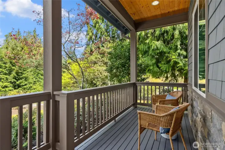 A covered front porch welcomes you home and greets your guests.