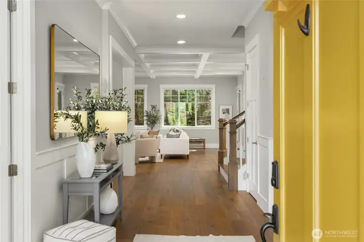 Gracious entryway with a storage closet.
