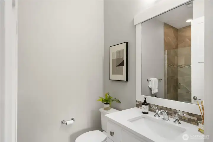 The 3/4 bath with a shower is connected to the main floor office or guest room.