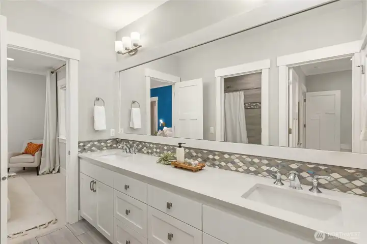 The connected Jack and Jill Bathroom for the third and fourth bedrooms.