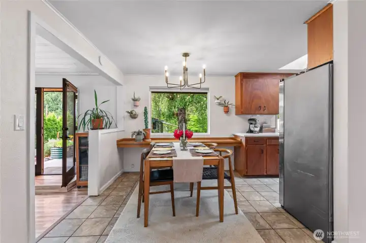 Dining area or bar space - with easy access to bring meals outdoors through French doors off of second living room.