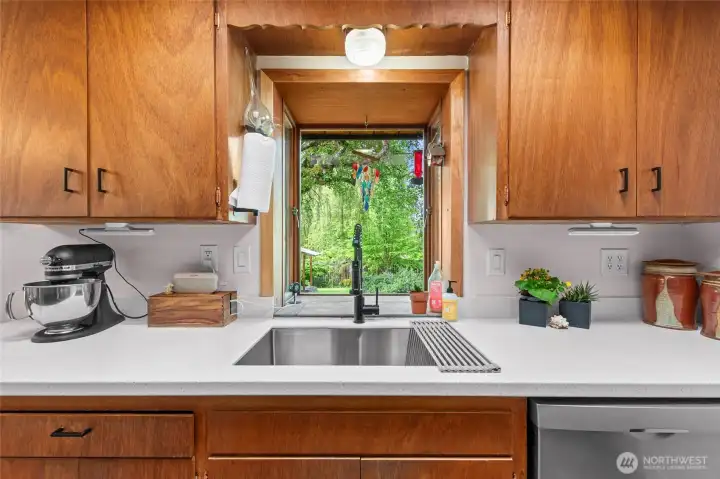 2025 Sink and faucet overlooking bay window and northwest sunsets in backyard garden.