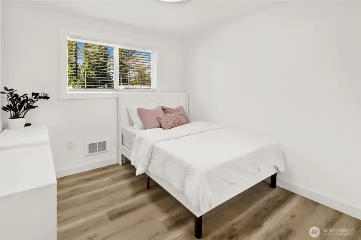 Bright updated bedroom #3 with nearby full bathroom, ideal for guests for everyday living!