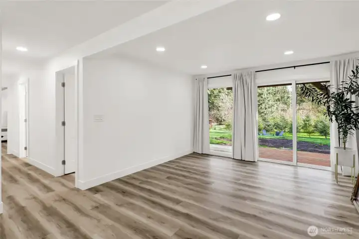 Lower level living area opens to backyard, perfect for indoor-outdoor enjoyment or multi generation living!