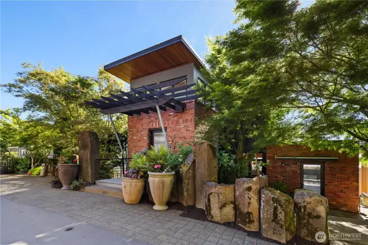 One of the finest estate style waterfront properties in all of Kirkland, this custom contemporary masterpiece on over one-half acre features high-end steel and concrete construction and artistic, professionally designed fixtures and finishes. One of the finest estate style waterfront properties in all of Kirkland, this custom contemporary masterpiece on over one-half acre features high-end steel and concrete construction and artistic, professionally designed fixtures and finishes.