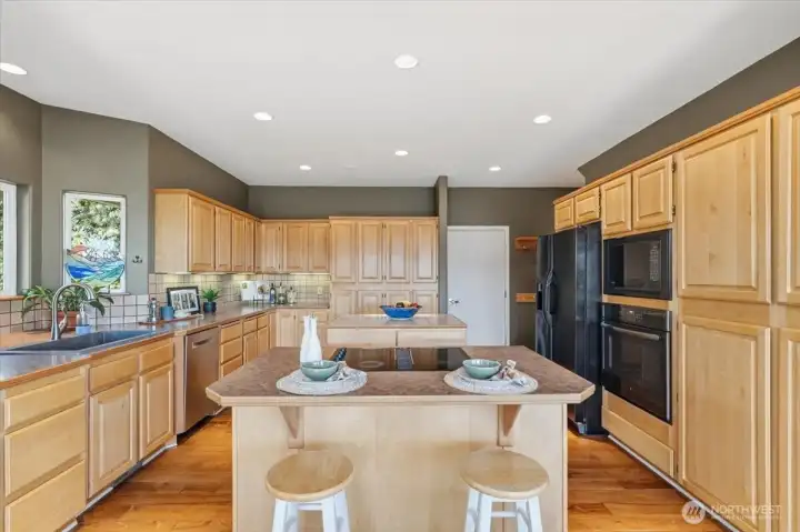 A spacious main-level kitchen with abundant storage and effortless functionality. A spacious main-level kitchen with abundant storage and effortless functionality.