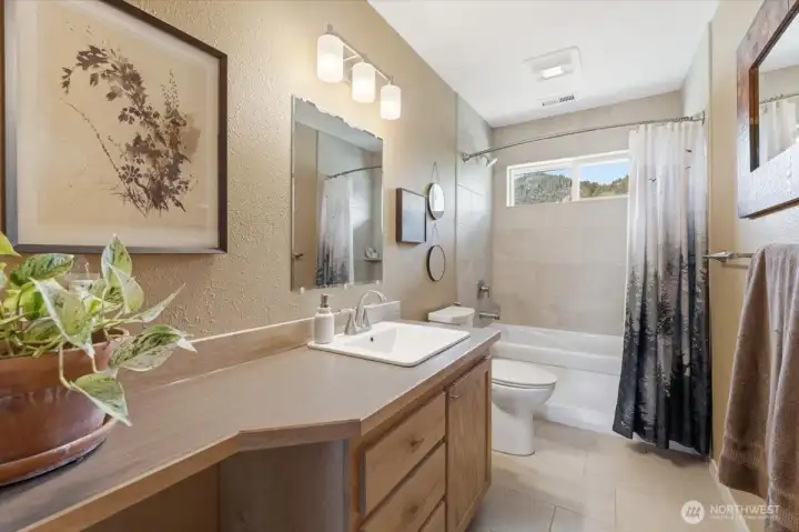Third floor full bathroom. Third floor full bathroom.