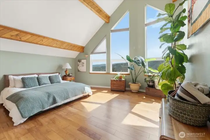 Third-floor primary suites with soaring cathedral ceilings and stunning view-filled windows. Third-floor primary suites with soaring cathedral ceilings and stunning view-filled windows.