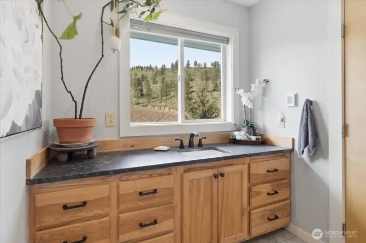 Third-floor primary bath featuring luxurious heated floors. Third-floor primary bath featuring luxurious heated floors.