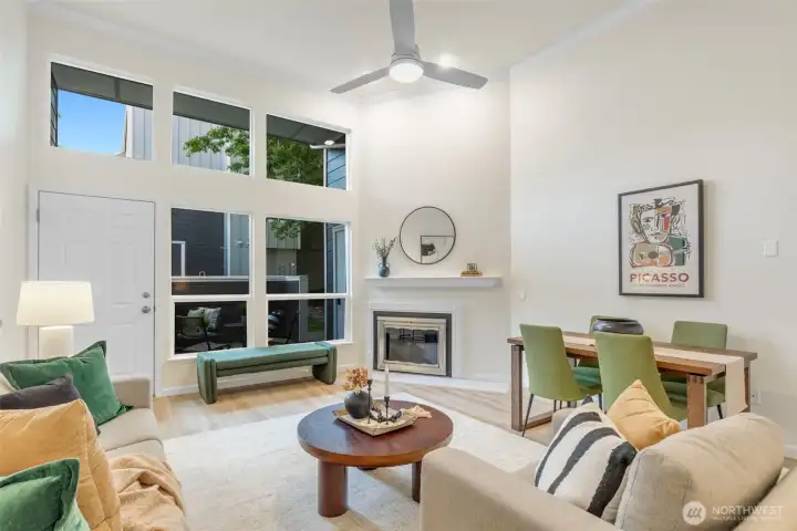 High ceilings, wood burning fireplace, and ceiling fan keep this condo comfortable in all seasons.