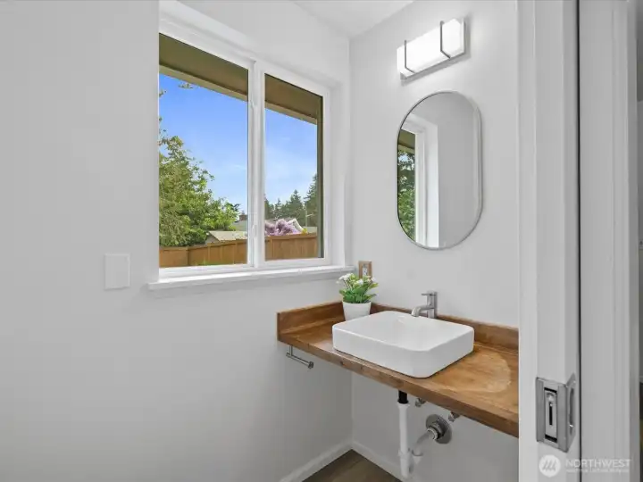 A convenient guest 1/2 bath.