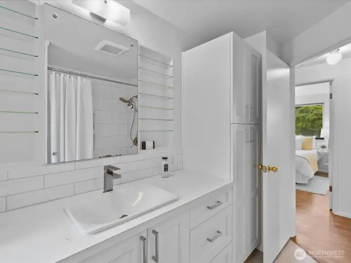 The updated full bath with generous storage.