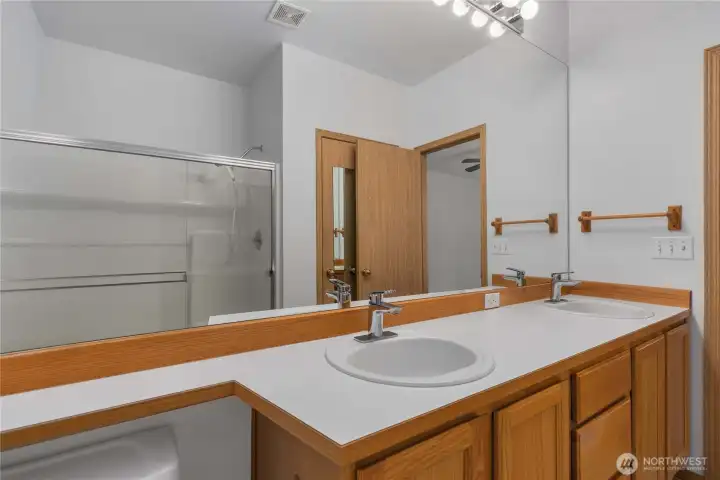 Primary bathroom is nicely sized and has a double sink vanity.