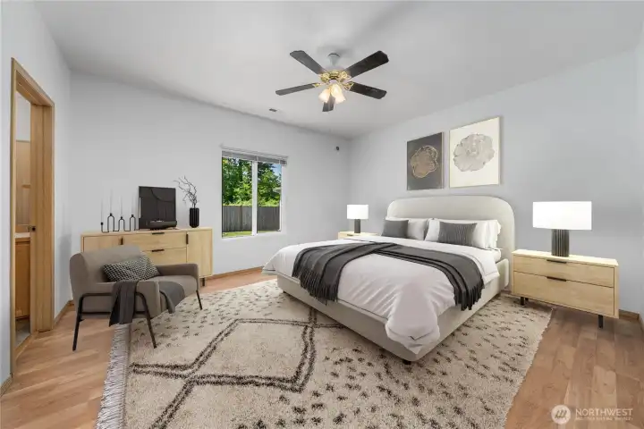 virtually staged primary suite.