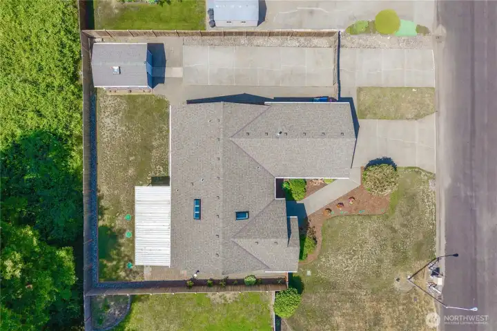 An overhead angle helps you appreciate the great lot layout. Notice the three different driveway pads!