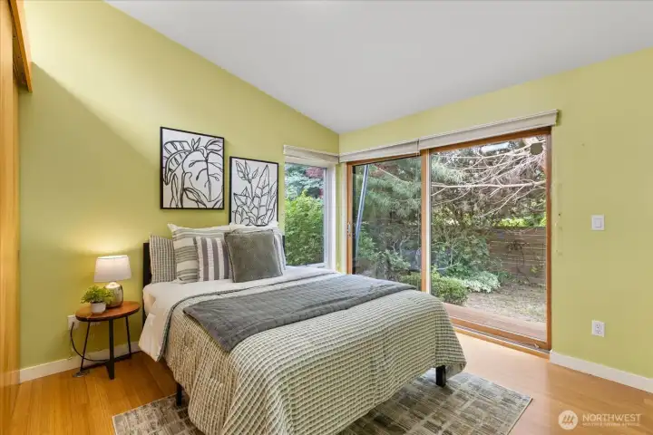 2nd bedroom with slider to backyard.