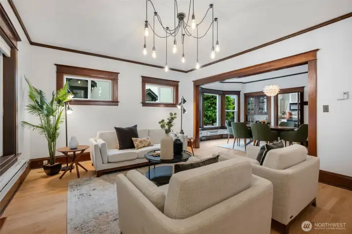 Rich original woodwork, detailed molding, and a leaded glass built-in china cabinet set a warm, distinctive tone.