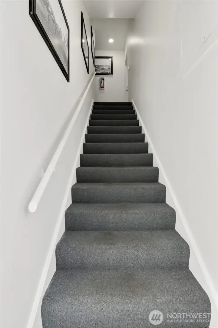 Updated secure, common entrance to 3 of the units