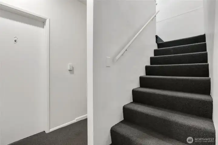 Updated secure, common entrance to 3 of the units