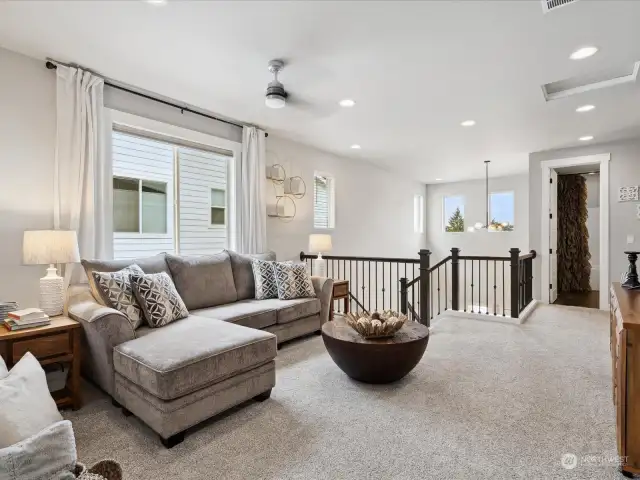 The upper level bonus room can be a special get-a-way for conversations or movie night.