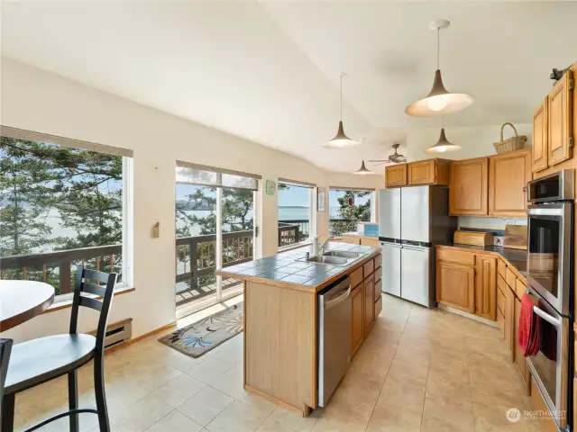 Slider in the middle is good for entertaining.  From kitchen right out the sliders to the deck.