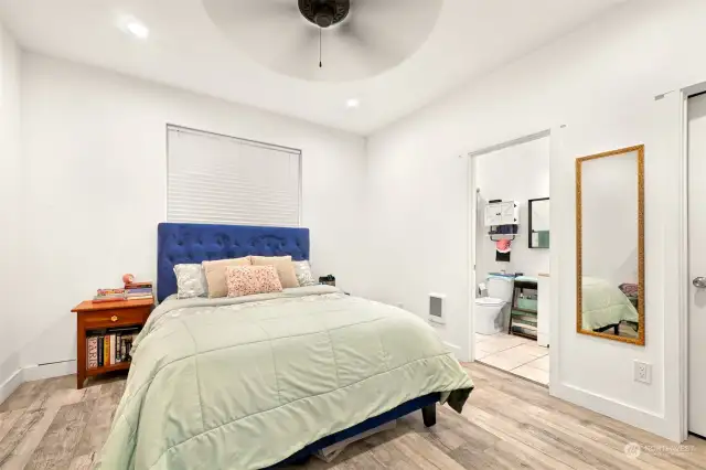 Primary bedroom with attached primary bathroom