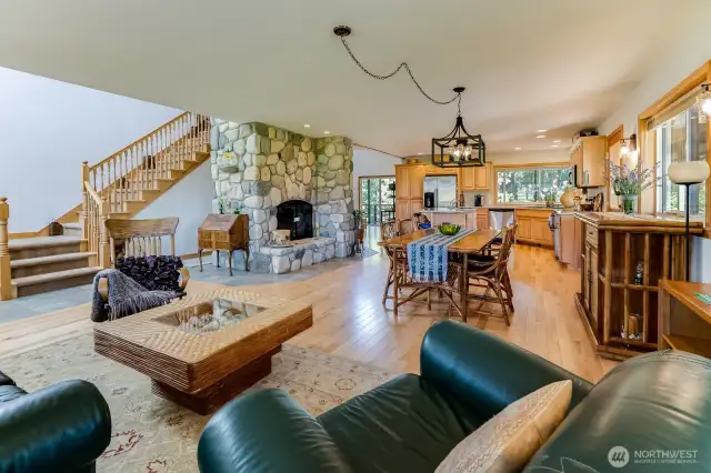 Spacious open floor plan links entertainment, dining, and the kitchen.