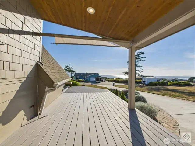 Relax on the covered side deck and enjoy the view, rain or shine.