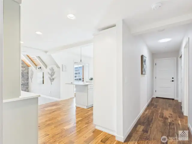 Thoughtfully connected spaces create a seamless flow from the garage to the kitchen and into the family room, enhancing everyday convenience and comfort.