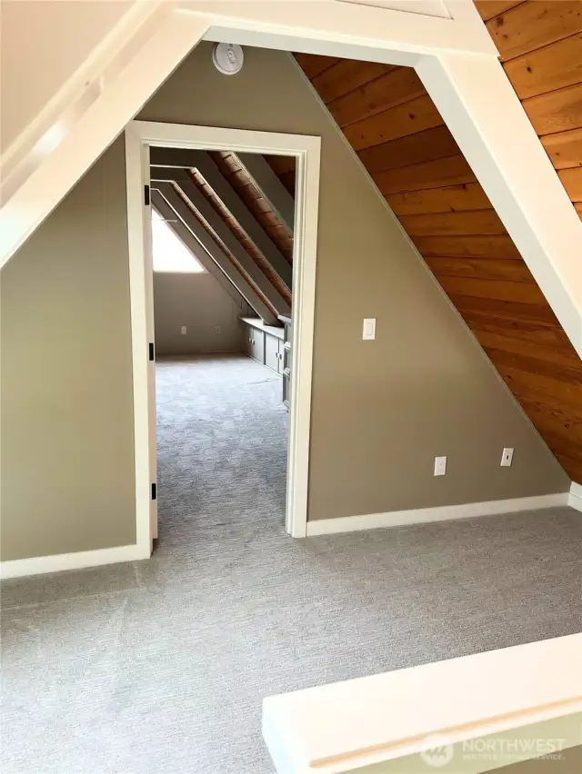 Upstairs sitting area open to the family room and leads to the 3rd bedroom.