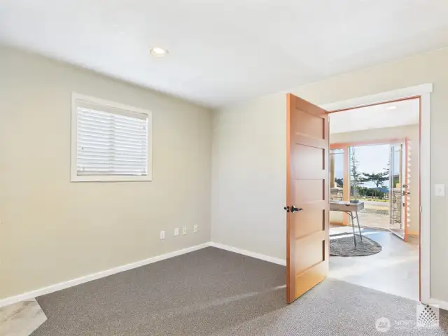 With a stunning custom door, newer carpet, and custom blinds, the office offers comfort and privacy, while providing direct access to the second entrance and half bath.