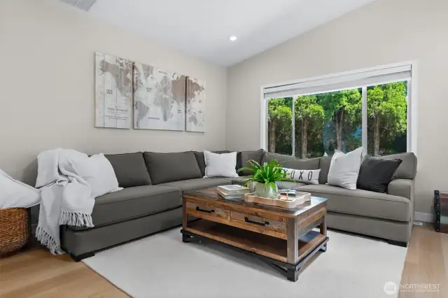 large living space with Vaulted ceilings
