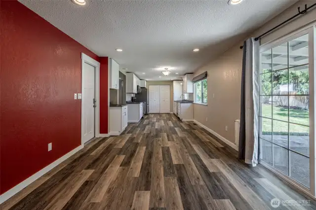 family room with sliding door to backyard