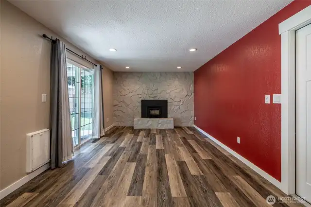 family room with doggy door to backyard