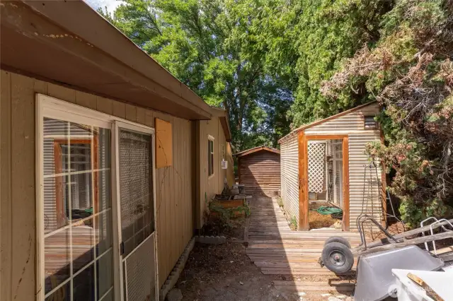 Family Room Slider  leads out to private garden area.