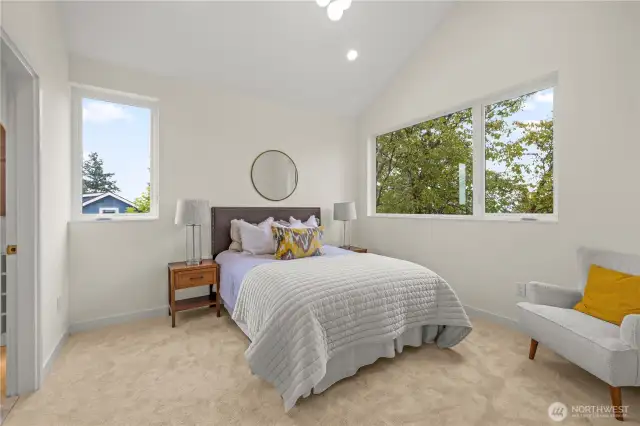 Primary suite with vaulted ceilings