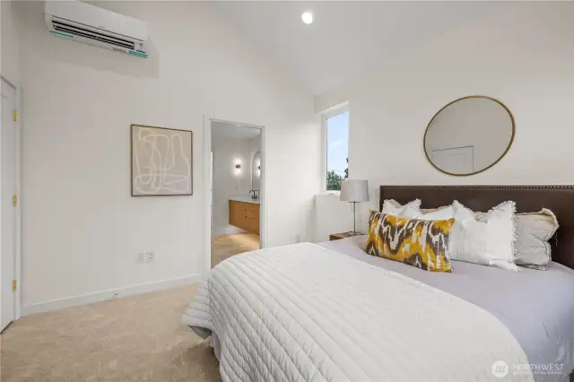 Primary suite with vaulted ceilings