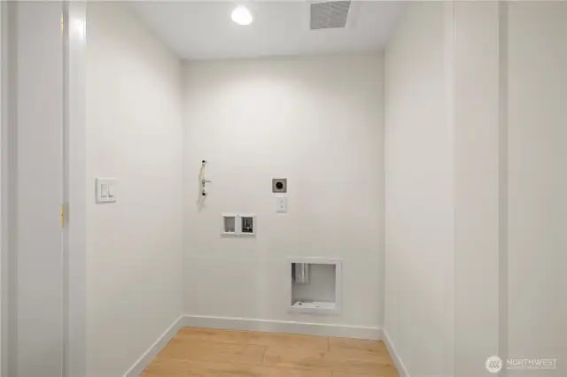 Room for a full size side by side washer/dryer