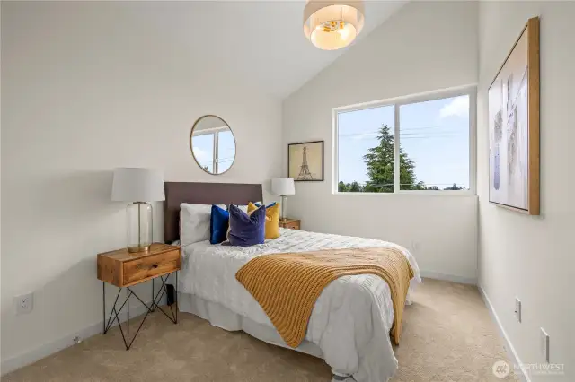2nd bedroom with vaulted ceilings