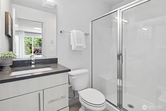Ensuite bath attached to ground floor guest bedroom.